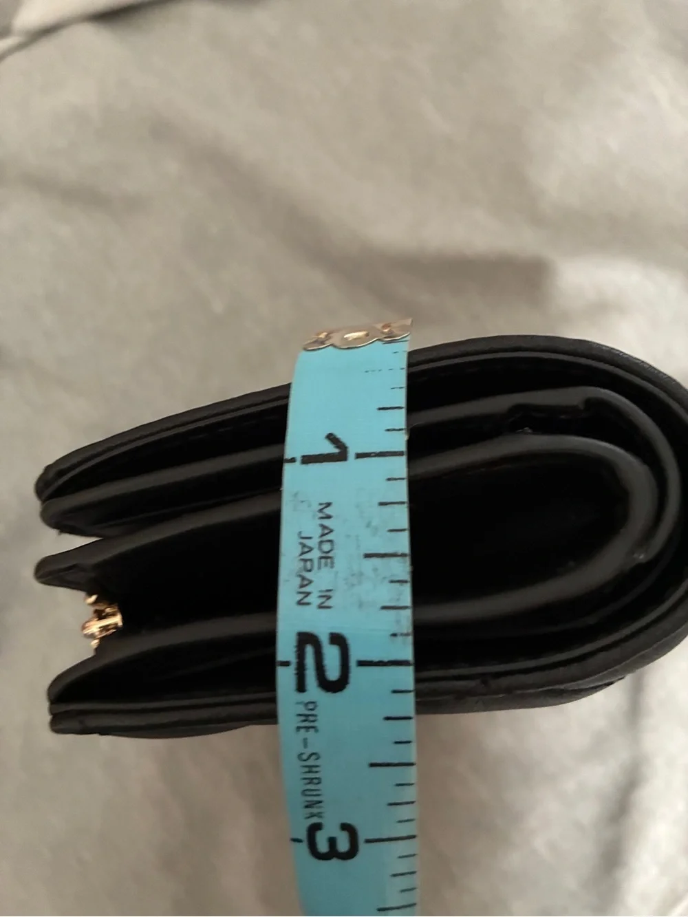 kate spade Medium Black Quilted Leather Zip-Around Wallet with Gold Logo